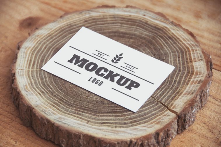 free logo mockup paper on wood