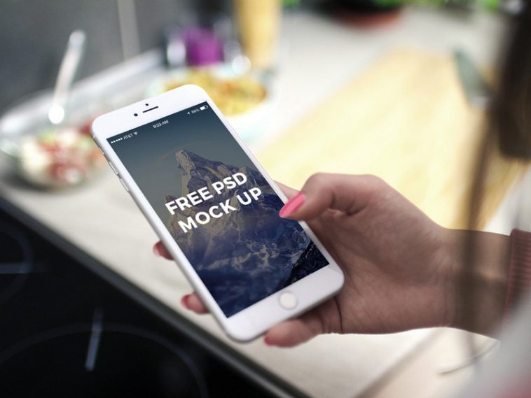 free iphone in woman hand mockup