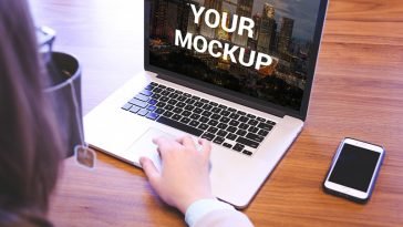 woman using macbook pro mockup